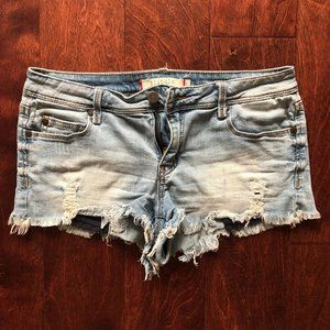 Low-mid rise pistola cut off denim shorts